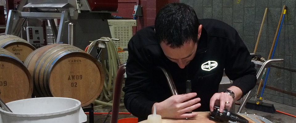 Adam Hersly filling barrels